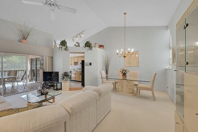 YOU'LL INSTANTLY FEEL AT HOME WHEN YOU STEP INTO THIS VAULTEDV on The Boca Country Club in Florida - for sale on GolfHomes.com, golf home, golf lot