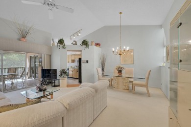 YOU'LL INSTANTLY FEEL AT HOME WHEN YOU STEP INTO THIS VAULTEDV on The Boca Country Club in Florida - for sale on GolfHomes.com, golf home, golf lot