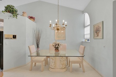 YOU'LL INSTANTLY FEEL AT HOME WHEN YOU STEP INTO THIS VAULTEDV on The Boca Country Club in Florida - for sale on GolfHomes.com, golf home, golf lot