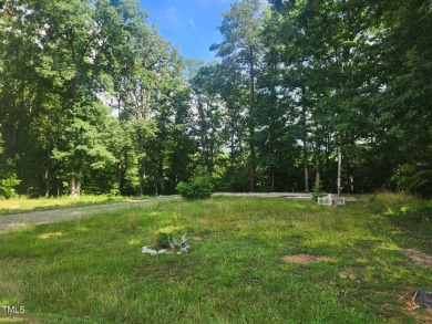 If you are looking for the perfect getaway spot, look no further on River Golf and County Club at Lake Royale in North Carolina - for sale on GolfHomes.com, golf home, golf lot