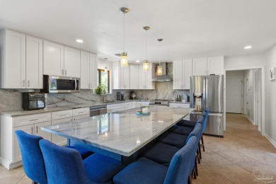 Step into effortless Florida living at this beautifully on Tiger Point Golf and Country Club in Florida - for sale on GolfHomes.com, golf home, golf lot