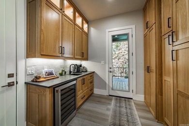 Breathtaking Modern Lakefront Retreat with Boat Slip Welcome to on Indian Hills Country Club in Arkansas - for sale on GolfHomes.com, golf home, golf lot