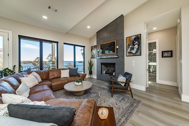 Breathtaking Modern Lakefront Retreat with Boat Slip Welcome to on Indian Hills Country Club in Arkansas - for sale on GolfHomes.com, golf home, golf lot