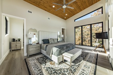 Breathtaking Modern Lakefront Retreat with Boat Slip Welcome to on Indian Hills Country Club in Arkansas - for sale on GolfHomes.com, golf home, golf lot