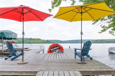 Step into a world inspired by Adirondack lake retreats, crafted on Copake Country Club in New York - for sale on GolfHomes.com, golf home, golf lot