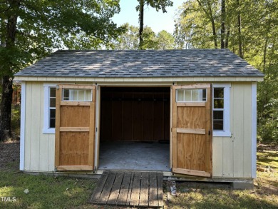 This beautiful, well-maintained home in West Henderson sits on a on Henderson Country Club in North Carolina - for sale on GolfHomes.com, golf home, golf lot