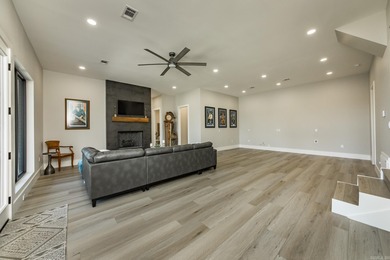 Breathtaking Modern Lakefront Retreat with Boat Slip Welcome to on Indian Hills Country Club in Arkansas - for sale on GolfHomes.com, golf home, golf lot