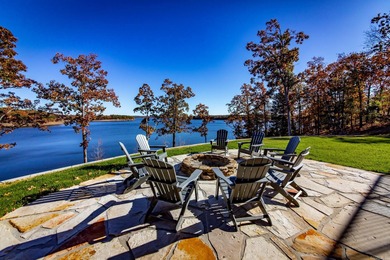 Breathtaking Modern Lakefront Retreat with Boat Slip Welcome to on Indian Hills Country Club in Arkansas - for sale on GolfHomes.com, golf home, golf lot