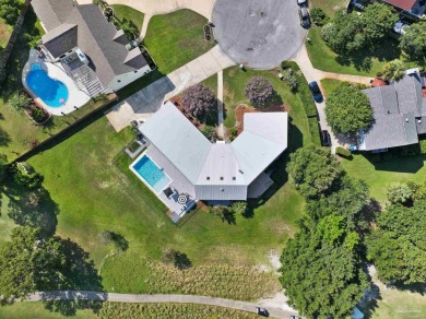 Step into effortless Florida living at this beautifully on Tiger Point Golf and Country Club in Florida - for sale on GolfHomes.com, golf home, golf lot