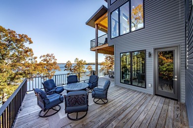 Breathtaking Modern Lakefront Retreat with Boat Slip Welcome to on Indian Hills Country Club in Arkansas - for sale on GolfHomes.com, golf home, golf lot