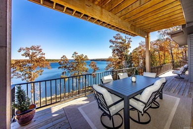 Breathtaking Modern Lakefront Retreat with Boat Slip Welcome to on Indian Hills Country Club in Arkansas - for sale on GolfHomes.com, golf home, golf lot