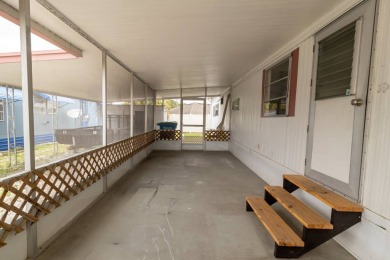 Nestled along the serene shores of Lake Smart, this charming on  in Florida - for sale on GolfHomes.com, golf home, golf lot