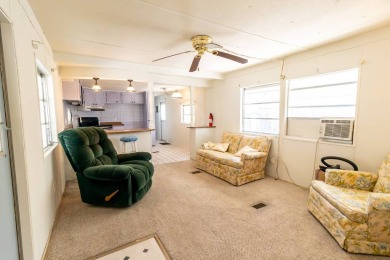 Nestled along the serene shores of Lake Smart, this charming on  in Florida - for sale on GolfHomes.com, golf home, golf lot