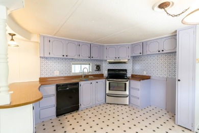 Nestled along the serene shores of Lake Smart, this charming on  in Florida - for sale on GolfHomes.com, golf home, golf lot