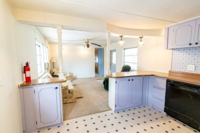 Nestled along the serene shores of Lake Smart, this charming on  in Florida - for sale on GolfHomes.com, golf home, golf lot