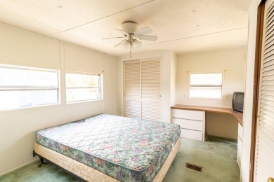 Nestled along the serene shores of Lake Smart, this charming on  in Florida - for sale on GolfHomes.com, golf home, golf lot