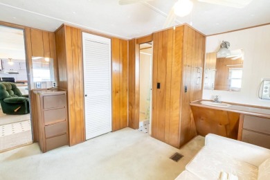 Nestled along the serene shores of Lake Smart, this charming on  in Florida - for sale on GolfHomes.com, golf home, golf lot