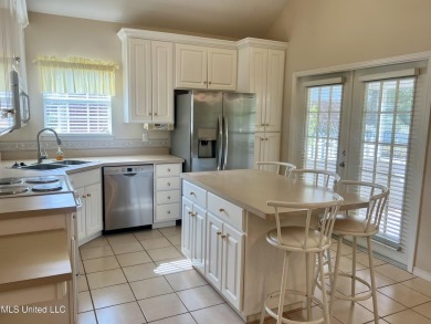 Beautiful Maintained Family Home located on the 16th Hole of on Mississippi National Golf Course in Mississippi - for sale on GolfHomes.com, golf home, golf lot