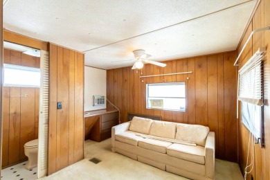 Nestled along the serene shores of Lake Smart, this charming on  in Florida - for sale on GolfHomes.com, golf home, golf lot