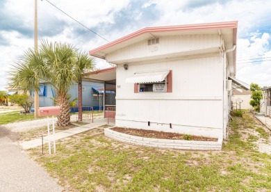Nestled along the serene shores of Lake Smart, this charming on  in Florida - for sale on GolfHomes.com, golf home, golf lot