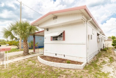 Nestled along the serene shores of Lake Smart, this charming on  in Florida - for sale on GolfHomes.com, golf home, golf lot