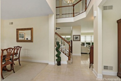 Welcome to this immaculately maintained home in the lovely gated on Boulder Ridge Country Club in Illinois - for sale on GolfHomes.com, golf home, golf lot