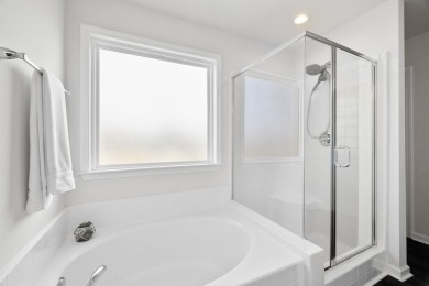 This stunning 4-bedroom, bright and airy home features an open on Woodfin Ridge Golf Club in South Carolina - for sale on GolfHomes.com, golf home, golf lot