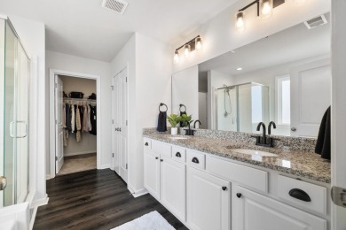 This stunning 4-bedroom, bright and airy home features an open on Woodfin Ridge Golf Club in South Carolina - for sale on GolfHomes.com, golf home, golf lot