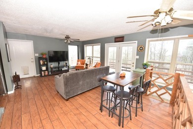 Nestled on a quiet street in the Bay, this charming home sits on on Indian Hills Country Club in Arkansas - for sale on GolfHomes.com, golf home, golf lot