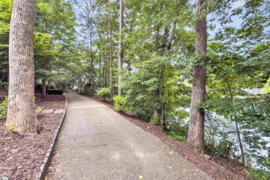 Located in the heart of The Village and surrounded by the beauty on The Reserve At Lake Keowee in South Carolina - for sale on GolfHomes.com, golf home, golf lot