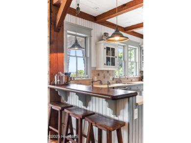 5BR/5.5BA Seaside luxury retreat redefines coastal living! on Bald Head Island Golf Club in North Carolina - for sale on GolfHomes.com, golf home, golf lot