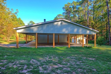 This 2 story beauty backs up to the national forest and is a on Pendleton Harbor in Texas - for sale on GolfHomes.com, golf home, golf lot