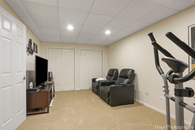 Welcome to this immaculately maintained home in the lovely gated on Boulder Ridge Country Club in Illinois - for sale on GolfHomes.com, golf home, golf lot