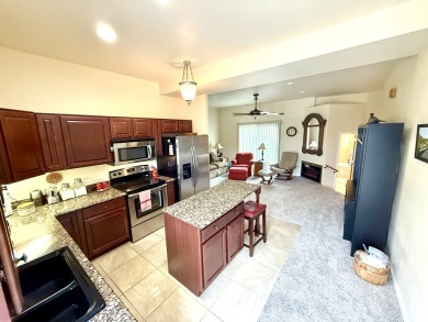 Enjoy beautiful, low-maintenance living in this updated 914 sq on Smoky Hill Country Club in Kansas - for sale on GolfHomes.com, golf home, golf lot