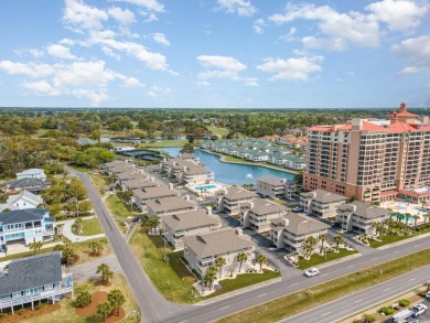 This furnished 2-bedroom condo is in the perfect location for on Surf Golf and Beach Club in South Carolina - for sale on GolfHomes.com, golf home, golf lot