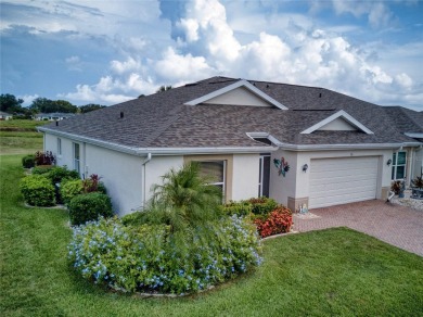 As you enter the enclosed entryway and step into the foyer the on Scepter Golf Club in Florida - for sale on GolfHomes.com, golf home, golf lot