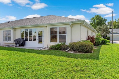 As you enter the enclosed entryway and step into the foyer the on Scepter Golf Club in Florida - for sale on GolfHomes.com, golf home, golf lot