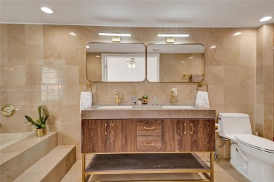 Live in the heart of a country club oasis without the country on Turnberry Isle Resort and Club in Florida - for sale on GolfHomes.com, golf home, golf lot