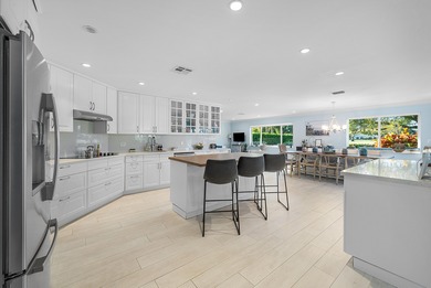 WOW! Perfectly sited on a premier .34-acre lot overlooking one on Atlantis Golf Club in Florida - for sale on GolfHomes.com, golf home, golf lot