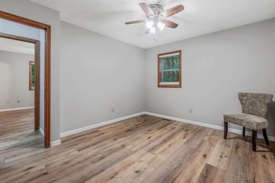 Nestled at the end of a peaceful dead-end street, this inviting on Mountain Ranch Golf Club in Arkansas - for sale on GolfHomes.com, golf home, golf lot
