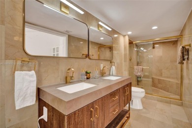 Live in the heart of a country club oasis without the country on Turnberry Isle Resort and Club in Florida - for sale on GolfHomes.com, golf home, golf lot