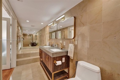 Live in the heart of a country club oasis without the country on Turnberry Isle Resort and Club in Florida - for sale on GolfHomes.com, golf home, golf lot
