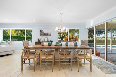 WOW! Perfectly sited on a premier .34-acre lot overlooking one on Atlantis Golf Club in Florida - for sale on GolfHomes.com, golf home, golf lot