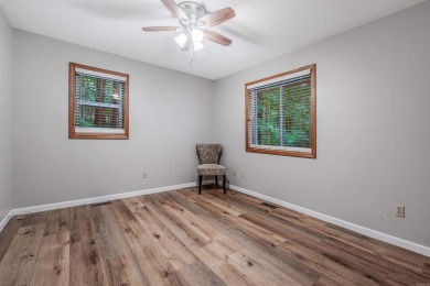 Nestled at the end of a peaceful dead-end street, this inviting on Mountain Ranch Golf Club in Arkansas - for sale on GolfHomes.com, golf home, golf lot