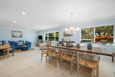 WOW! Perfectly sited on a premier .34-acre lot overlooking one on Atlantis Golf Club in Florida - for sale on GolfHomes.com, golf home, golf lot