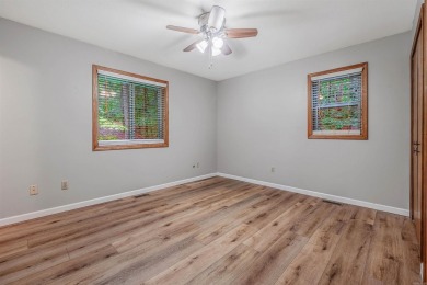 Nestled at the end of a peaceful dead-end street, this inviting on Mountain Ranch Golf Club in Arkansas - for sale on GolfHomes.com, golf home, golf lot