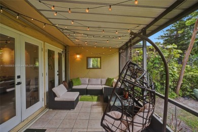 Live in the heart of a country club oasis without the country on Turnberry Isle Resort and Club in Florida - for sale on GolfHomes.com, golf home, golf lot