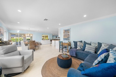 WOW! Perfectly sited on a premier .34-acre lot overlooking one on Atlantis Golf Club in Florida - for sale on GolfHomes.com, golf home, golf lot