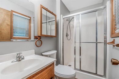 Nestled at the end of a peaceful dead-end street, this inviting on Mountain Ranch Golf Club in Arkansas - for sale on GolfHomes.com, golf home, golf lot