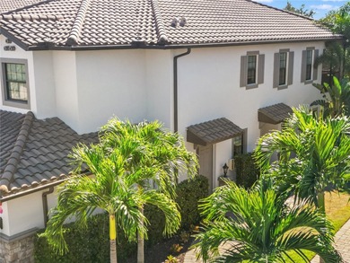 Beautifully maintained End unit condominium. Experience on Esplanade Golf and Country at Lakewood Ranch in Florida - for sale on GolfHomes.com, golf home, golf lot